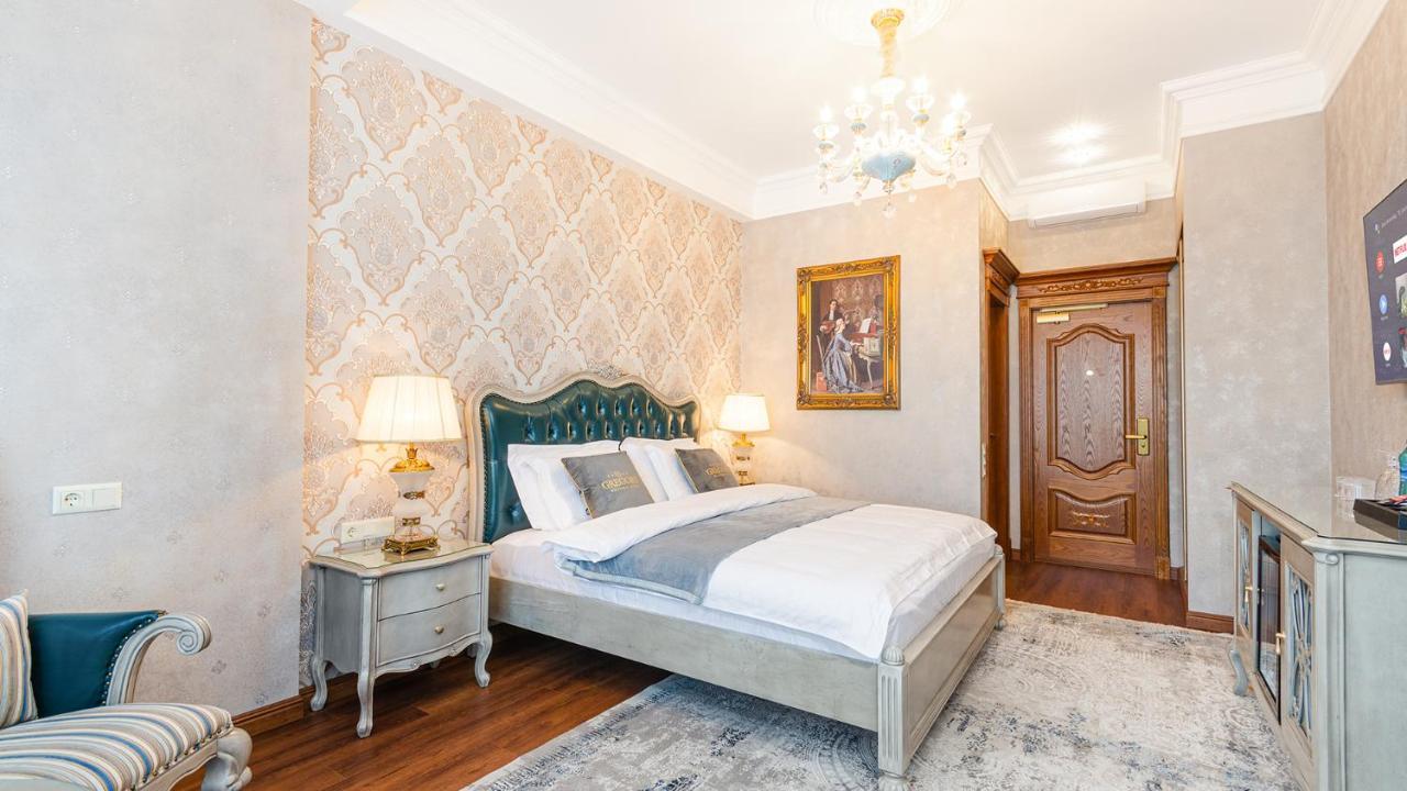 Gregory Boutique Hotel Chişinău Eksteriør billede A bedroom